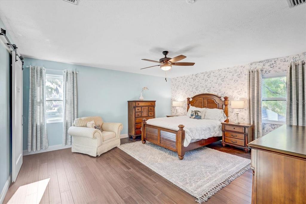 4710 Stearns Road Valrico, FL 33596 - Photo 41 of 63 a bedroom with a bed and a large window