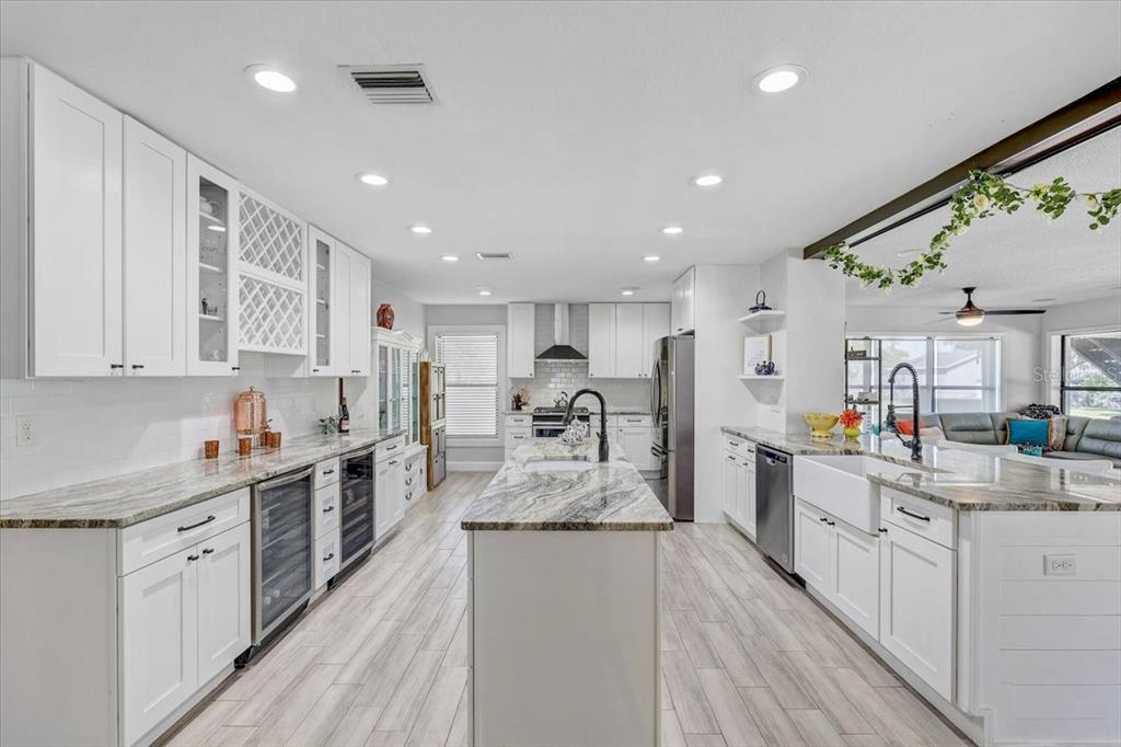 4710 Stearns Road Valrico, FL 33596 - Photo 6 of 63 a large kitchen with stainless steel appliances lots of counter top space