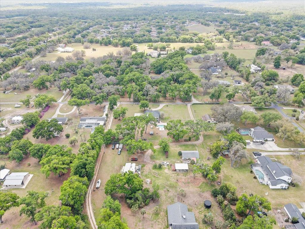 4710 Stearns Road Valrico, FL 33596 - Photo 63 of 63 an aerial view of residential houses with outdoor space and river