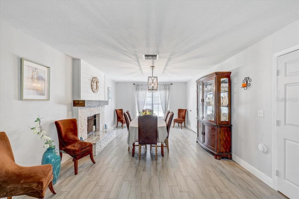 4710 Stearns Road Valrico, FL 33596 - Photo 10 of 63 a view of a livingroom with furniture window and wooden floor