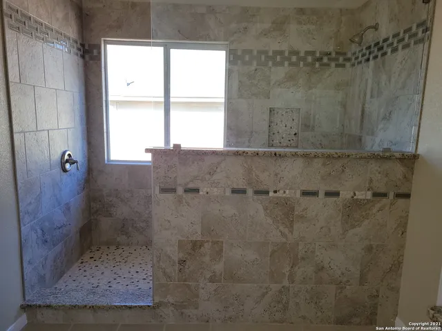 a bathroom with a window