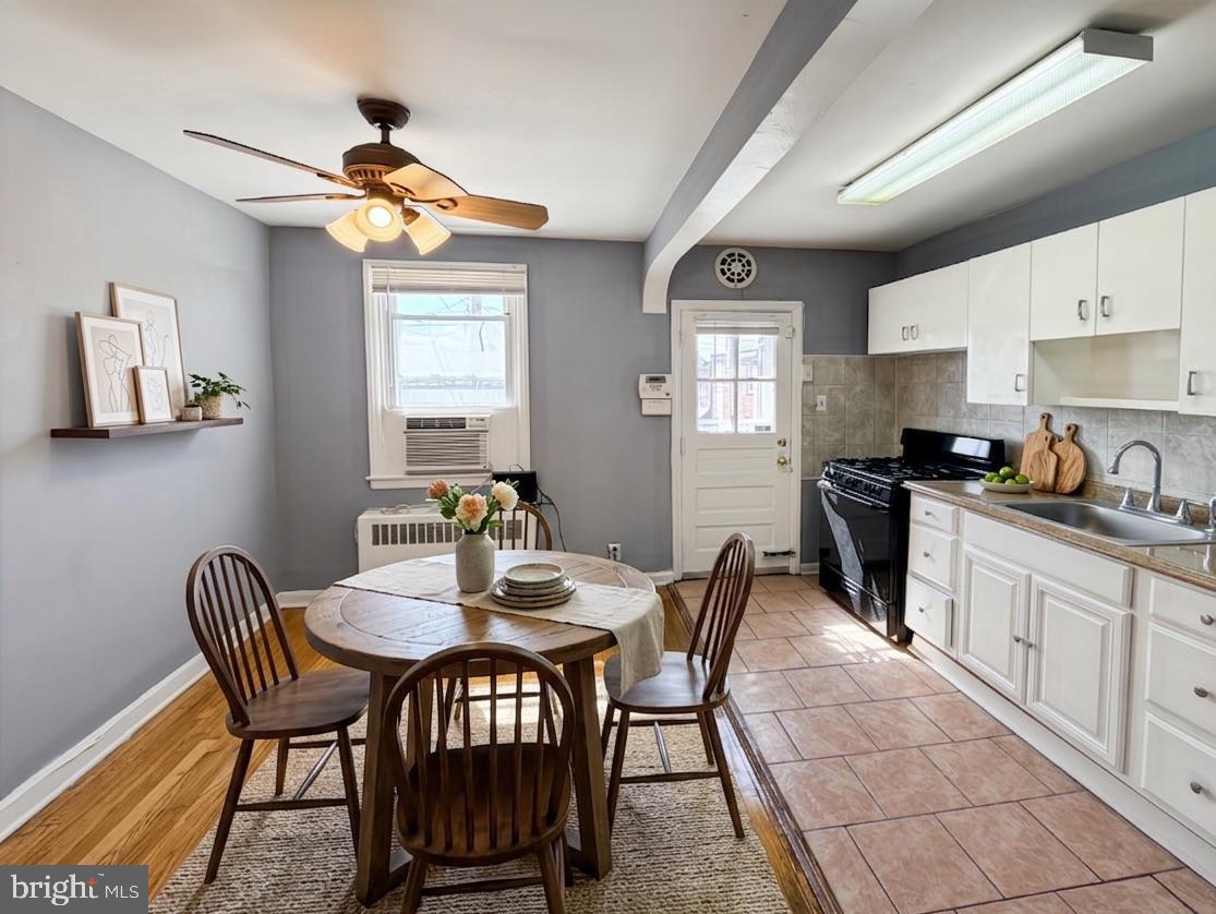 2709 East Hoffman Street Baltimore, MD 21213 - Photo 7 of 39 Virtually staged Dining Room