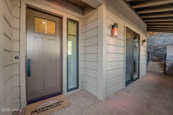 a view of a door and storage space
