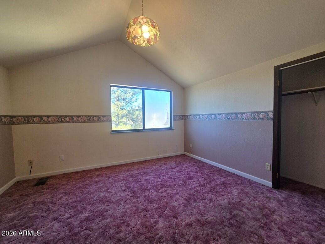 103 South Mc Lane Road Payson, AZ 85541 - Photo 15 of 26 wooden floor in an empty room with a window