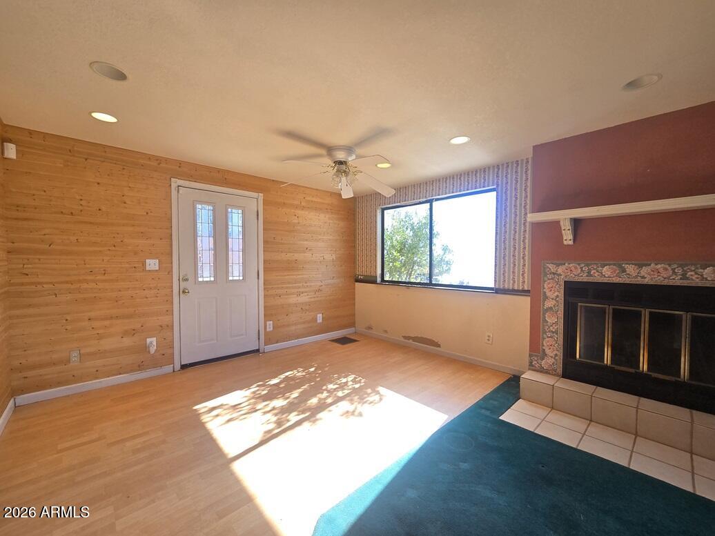 103 South Mc Lane Road Payson, AZ 85541 - Photo 2 of 26 a view of livingroom with furniture window and wooden floor