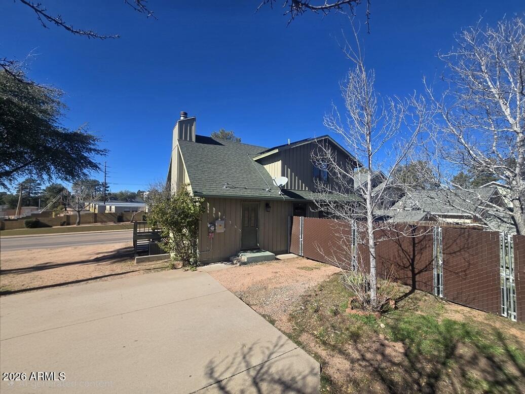 103 South Mc Lane Road Payson, AZ 85541 - Photo 26 of 26 a view of a house with a snow in the background