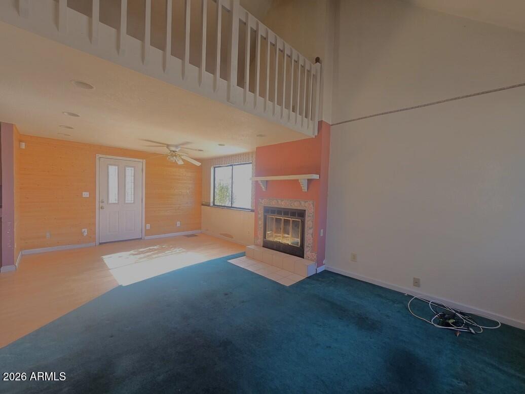 103 South Mc Lane Road Payson, AZ 85541 - Photo 4 of 26 a view of empty room with fireplace