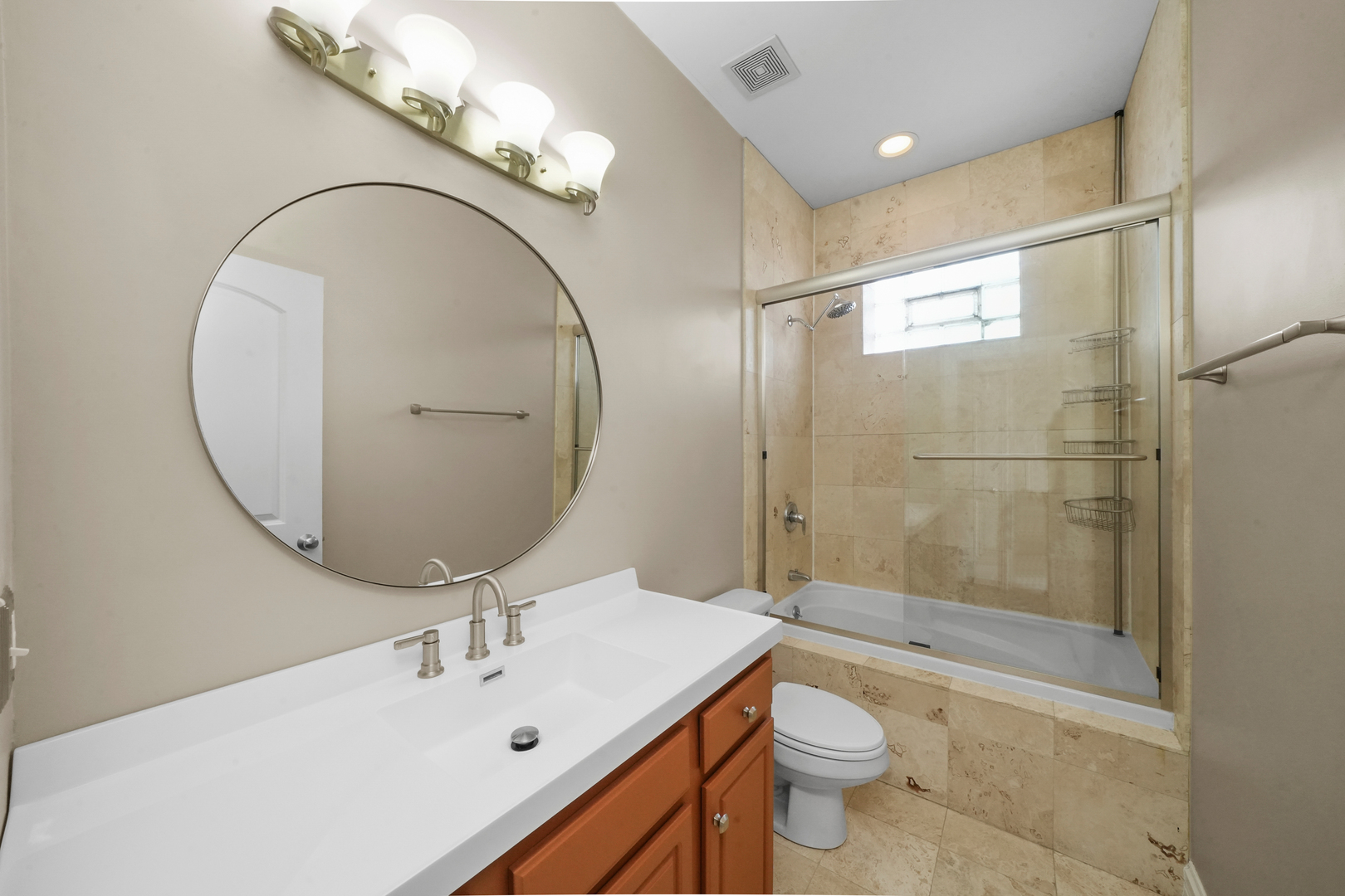 2503 West Harrison Street, Unit 4 Chicago, IL 60612 - Photo 18 of 31 a bathroom with a sink a toilet and shower