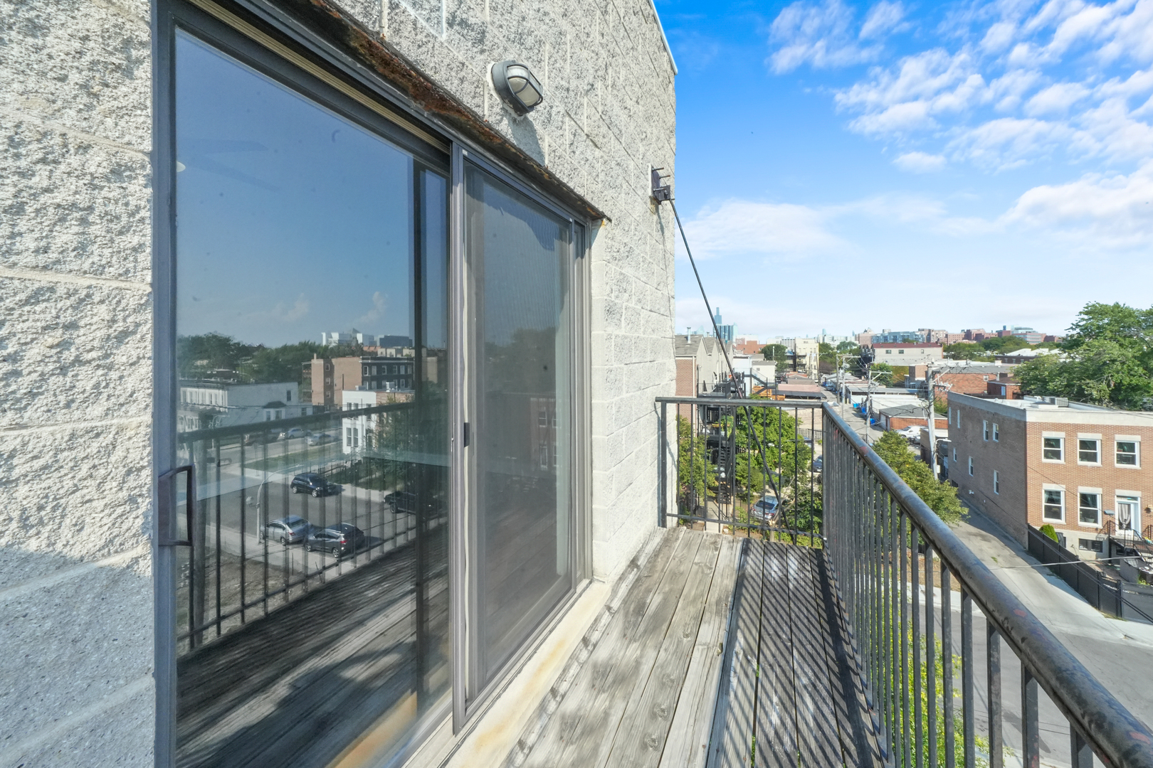 2503 West Harrison Street, Unit 4 Chicago, IL 60612 - Photo 23 of 31 a balcony with a city view