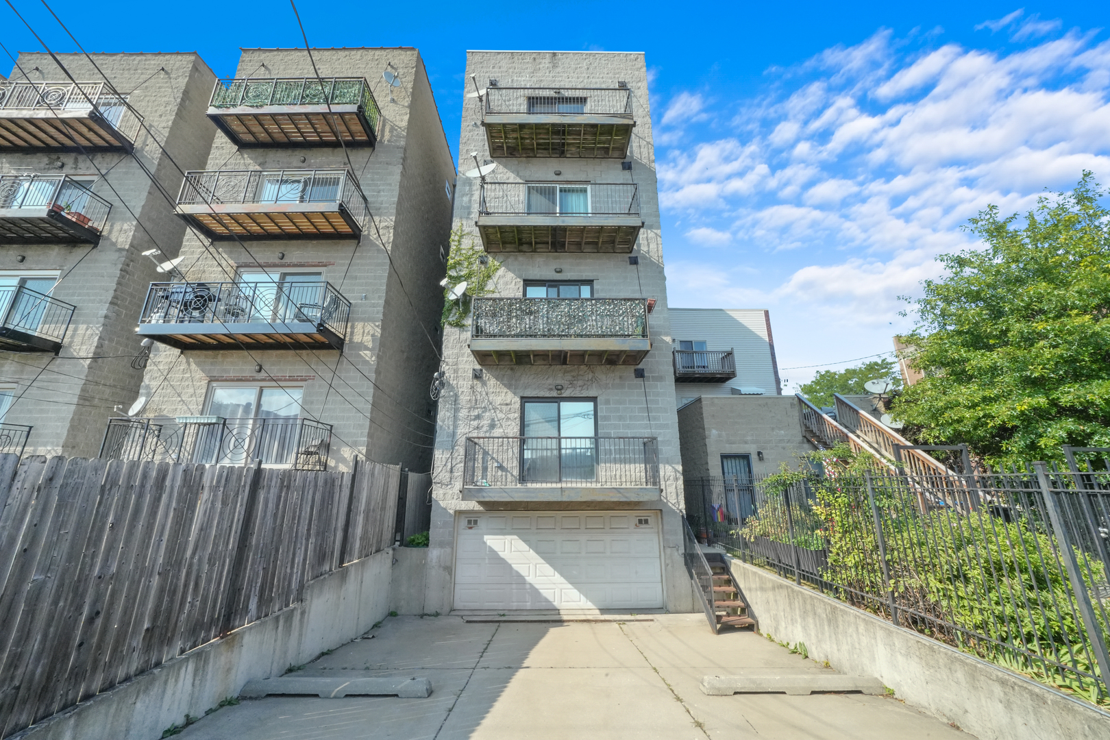 2503 West Harrison Street, Unit 4 Chicago, IL 60612 - Photo 28 of 31 a front view of a house with a garden