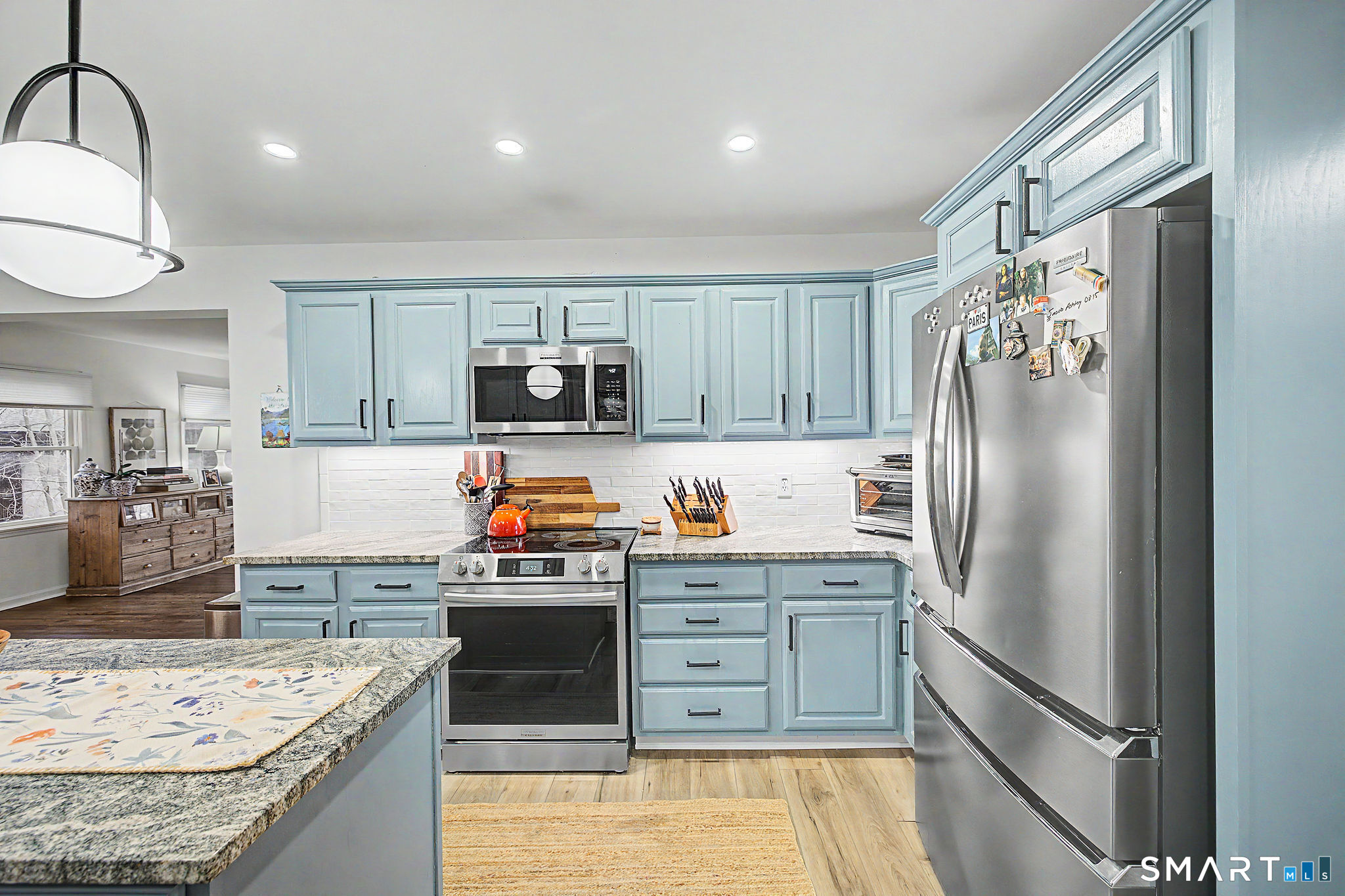 14 Shore Road Danbury, CT 06811 - Photo 11 of 30 a kitchen with stainless steel appliances granite countertop a refrigerator and a stove top oven