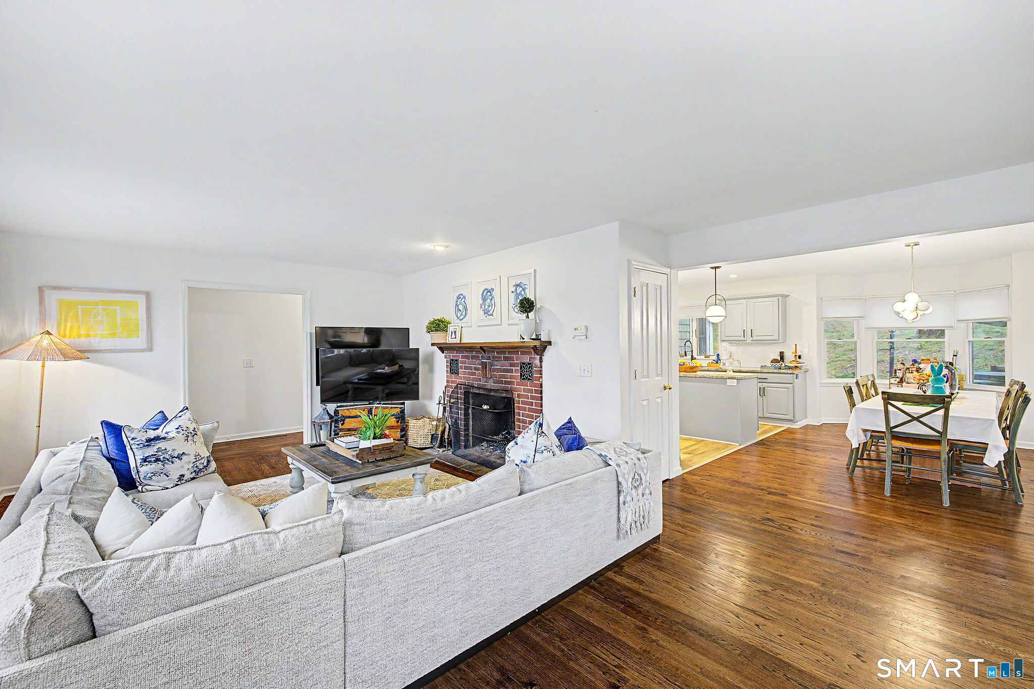 14 Shore Road Danbury, CT 06811 - Photo 13 of 30 a living room with furniture and a wooden floor