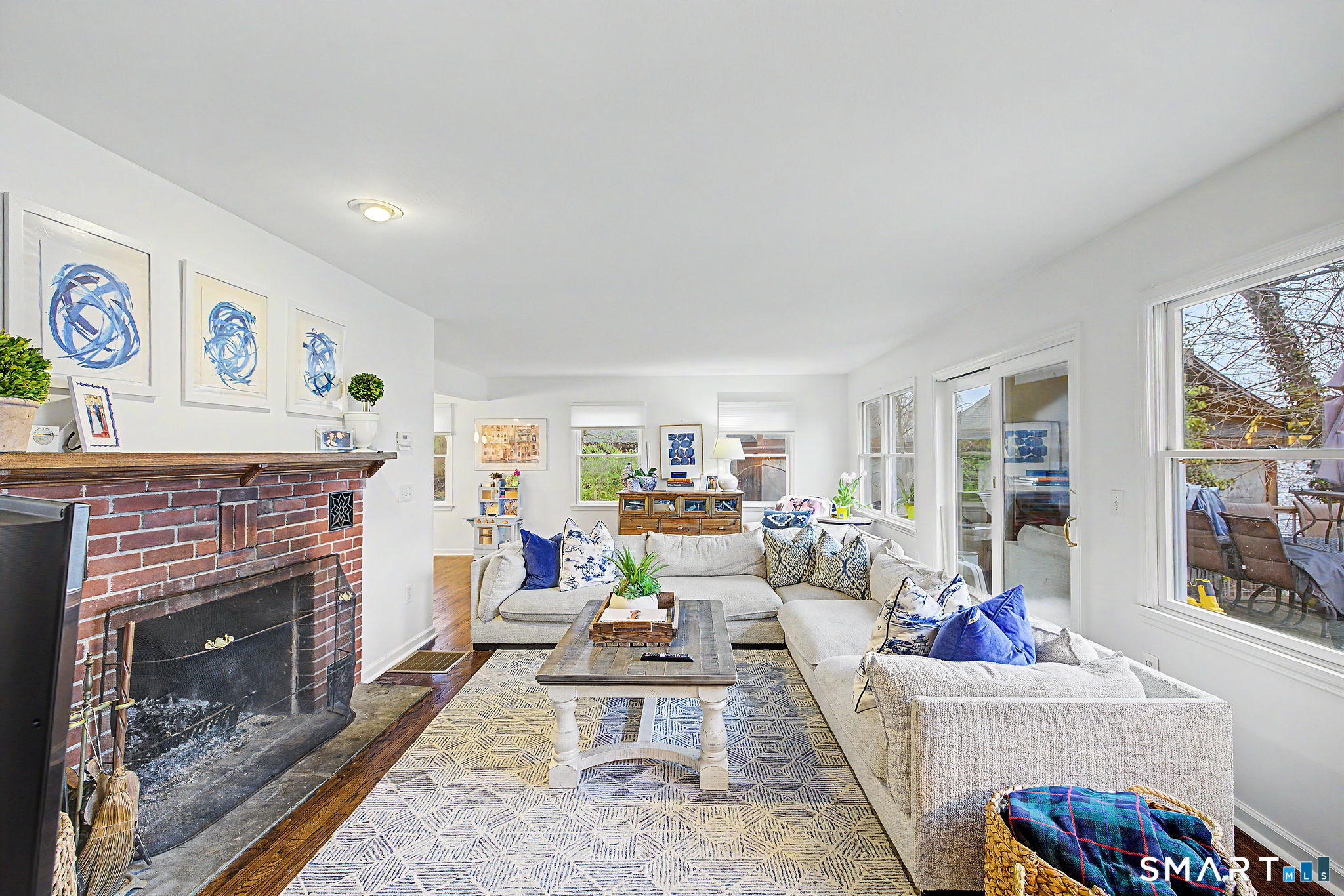 14 Shore Road Danbury, CT 06811 - Photo 14 of 30 a living room with furniture and a fireplace