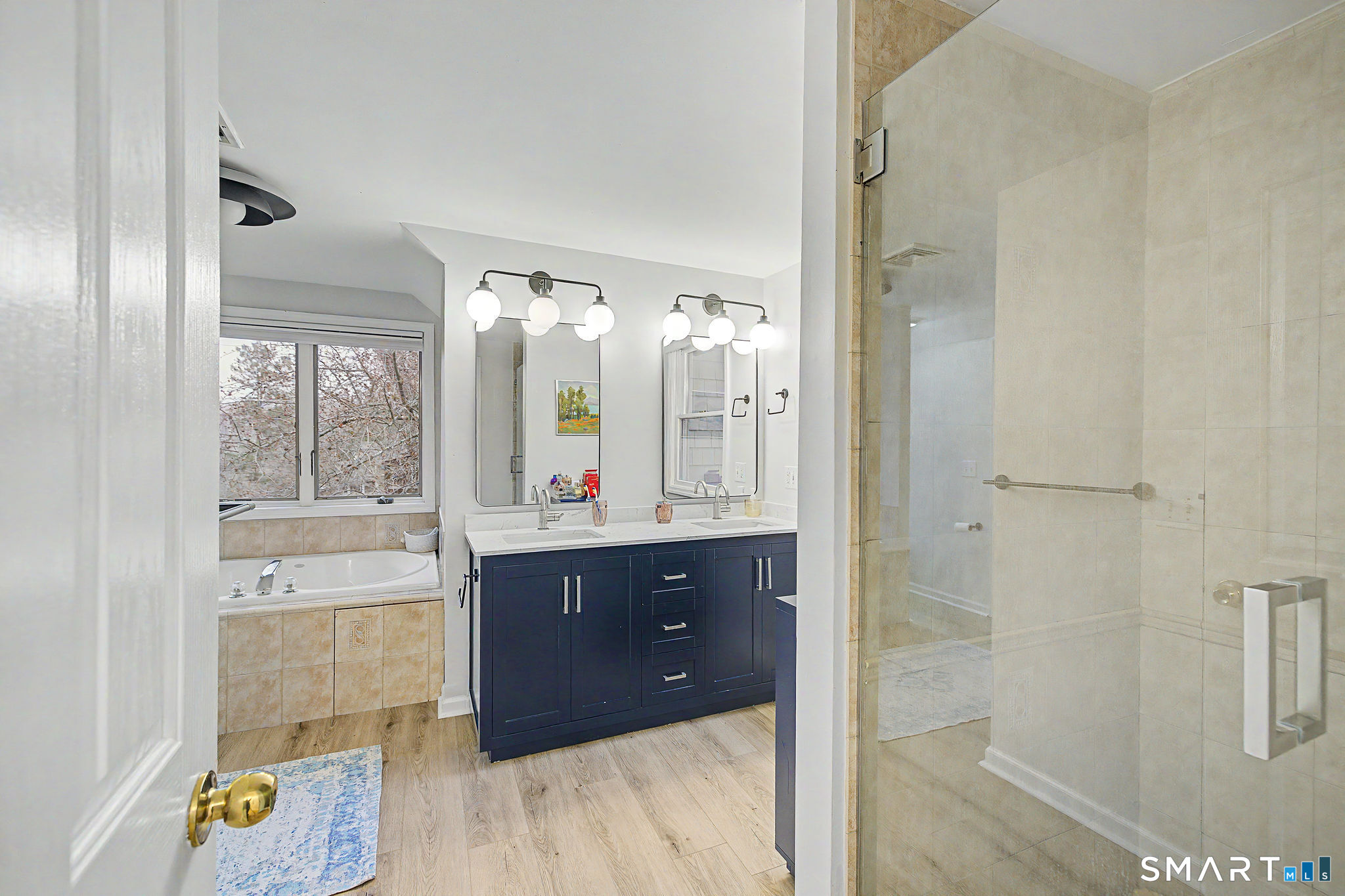 14 Shore Road Danbury, CT 06811 - Photo 20 of 30 a bathroom with a sink mirror and vanity