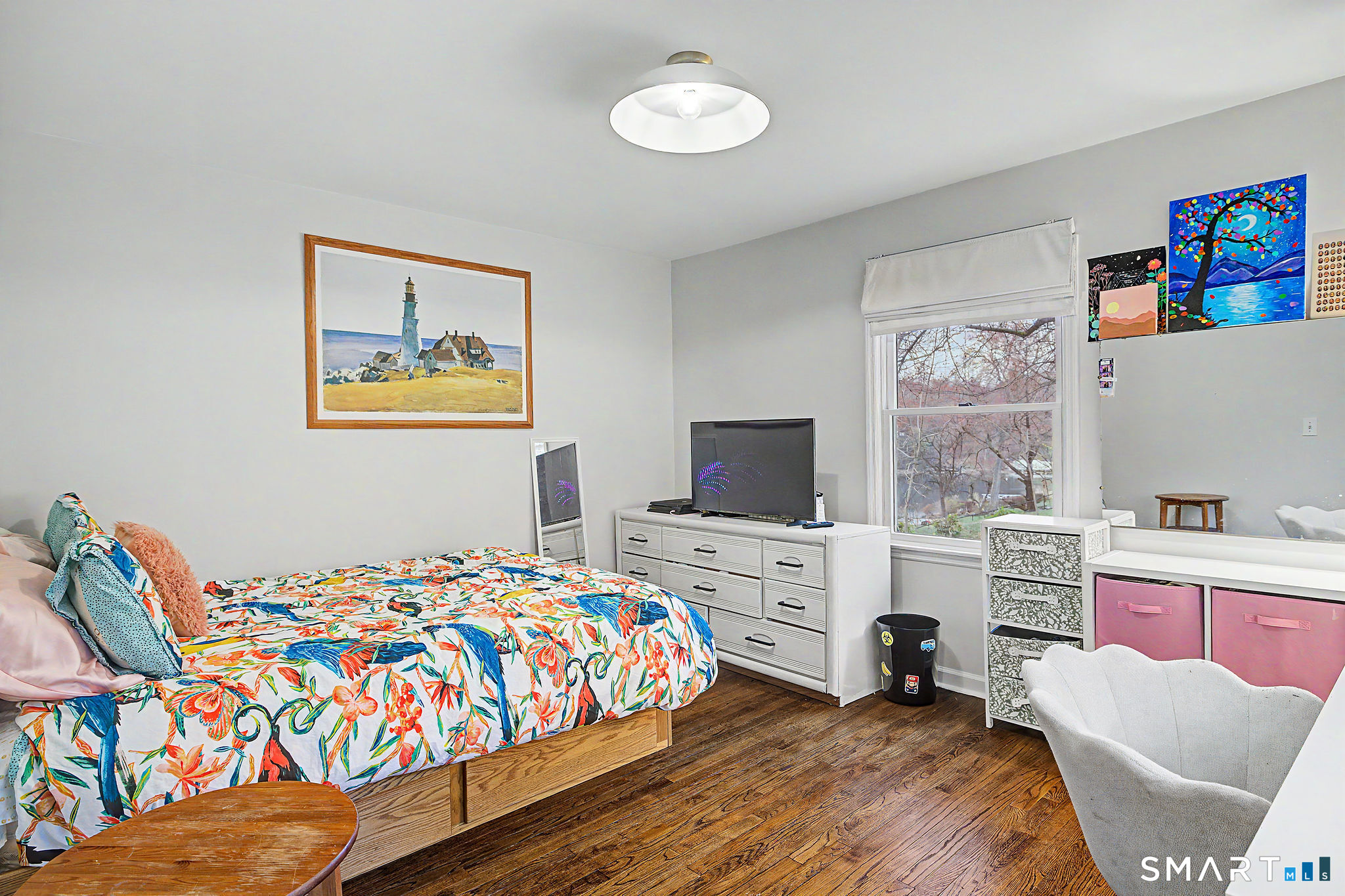 14 Shore Road Danbury, CT 06811 - Photo 22 of 30 a bedroom with a bed and a flat screen tv