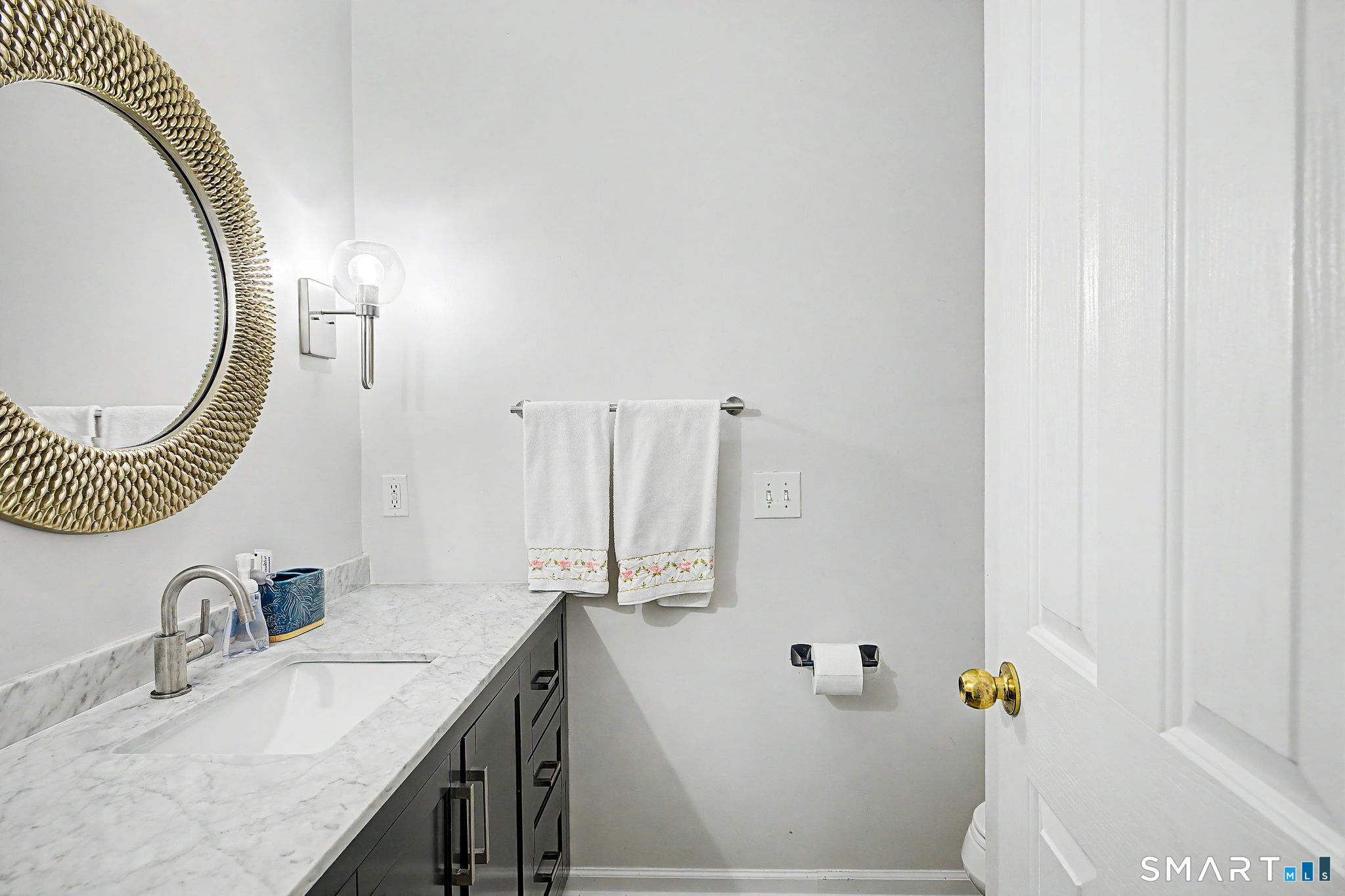 14 Shore Road Danbury, CT 06811 - Photo 23 of 30 a bathroom with a granite countertop sink and a mirror