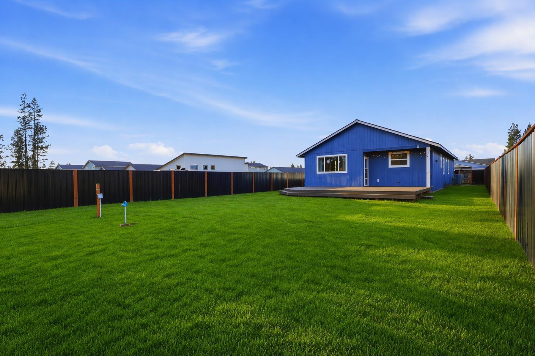 16455 Bassett Road La Pine, OR 97739 - Photo 31 of 44 a view of a house with a backyard