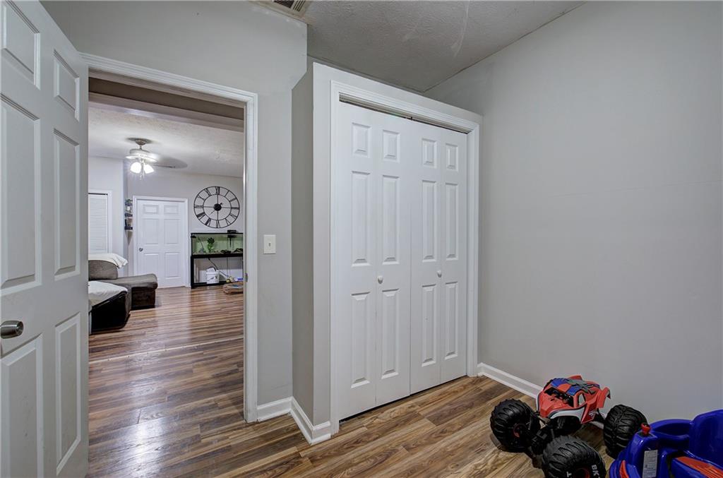 413 Calhoun Avenue Northeast Rome, GA 30161 - Photo 15 of 27 a view of entryway with livingroom and wooden floor