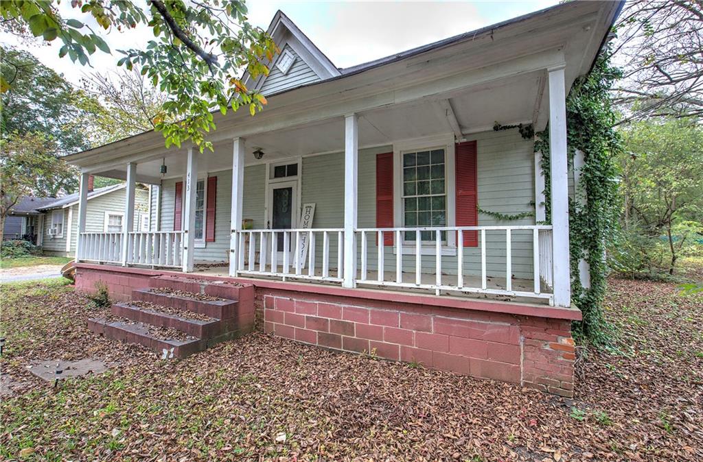 413 Calhoun Avenue Northeast Rome, GA 30161 - Photo 2 of 27 front view of a house with a small yard