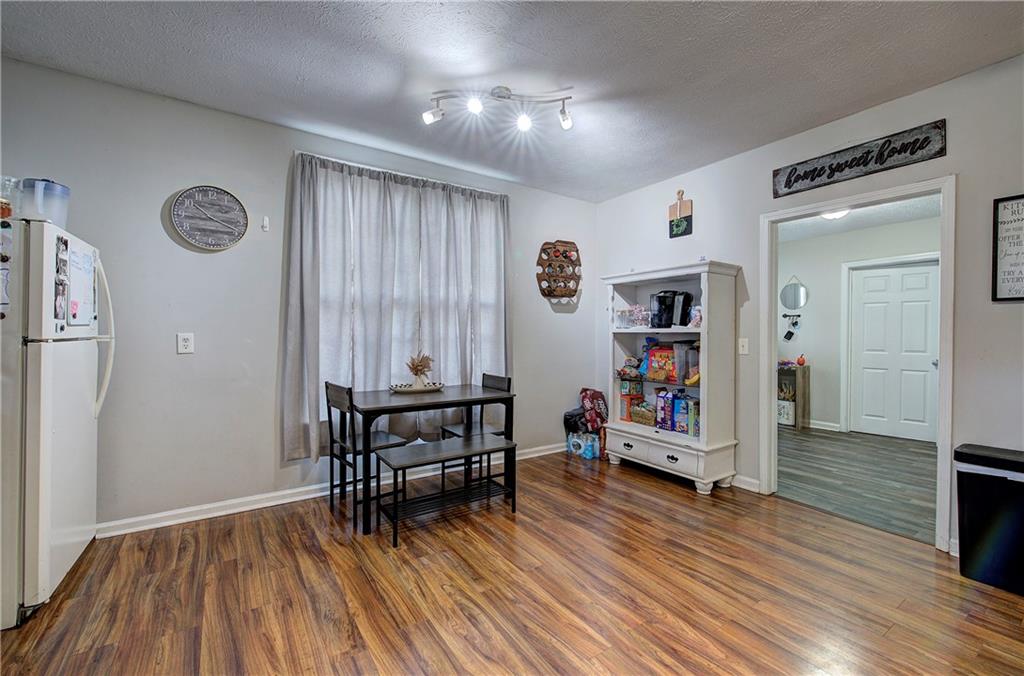 413 Calhoun Avenue Northeast Rome, GA 30161 - Photo 10 of 27 a view of a room with gym equipment