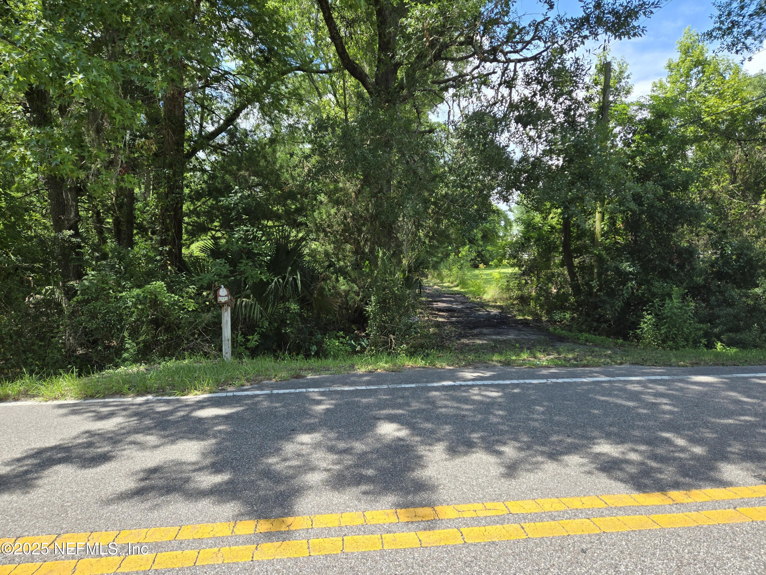 5771 Gilchrist Road Jacksonville, FL 32219 - Photo 9 of 10 a view of a yard