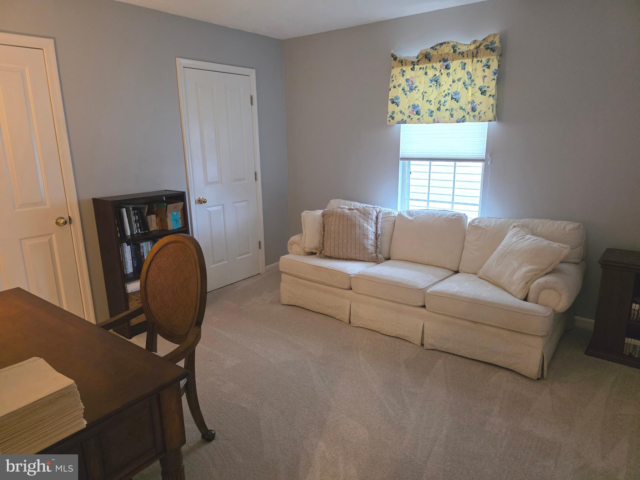 2441 Kemper Road Crofton, MD 21114 - Photo 38 of 63 a living room with furniture and a window