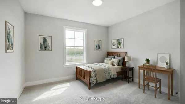 a bed room with a bed and a window