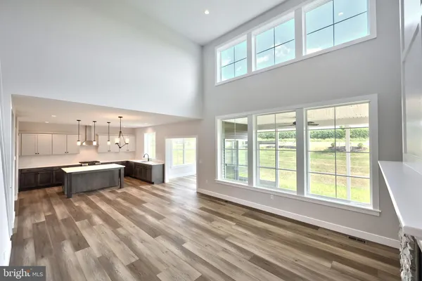 a large living room with a large window