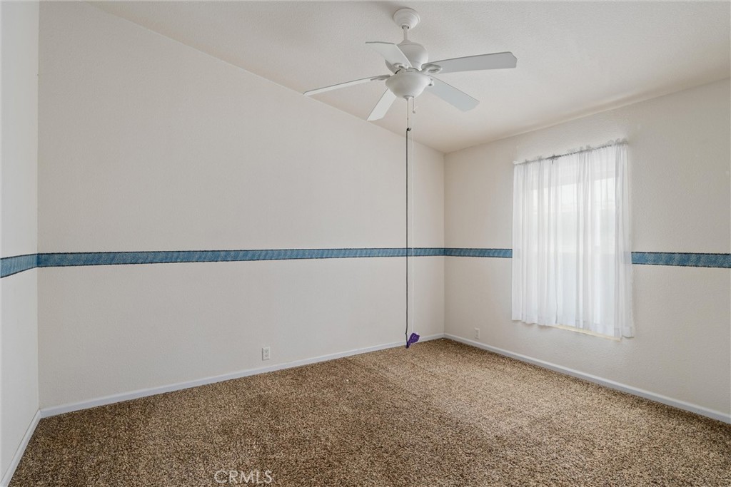 193 Railbridge Road Oroville, CA 95966 - Photo 20 of 32 a view of an empty room with a window
