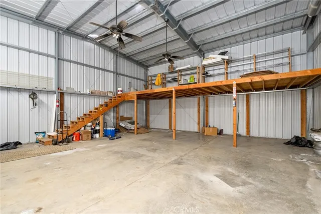a view of a garage with chairs
