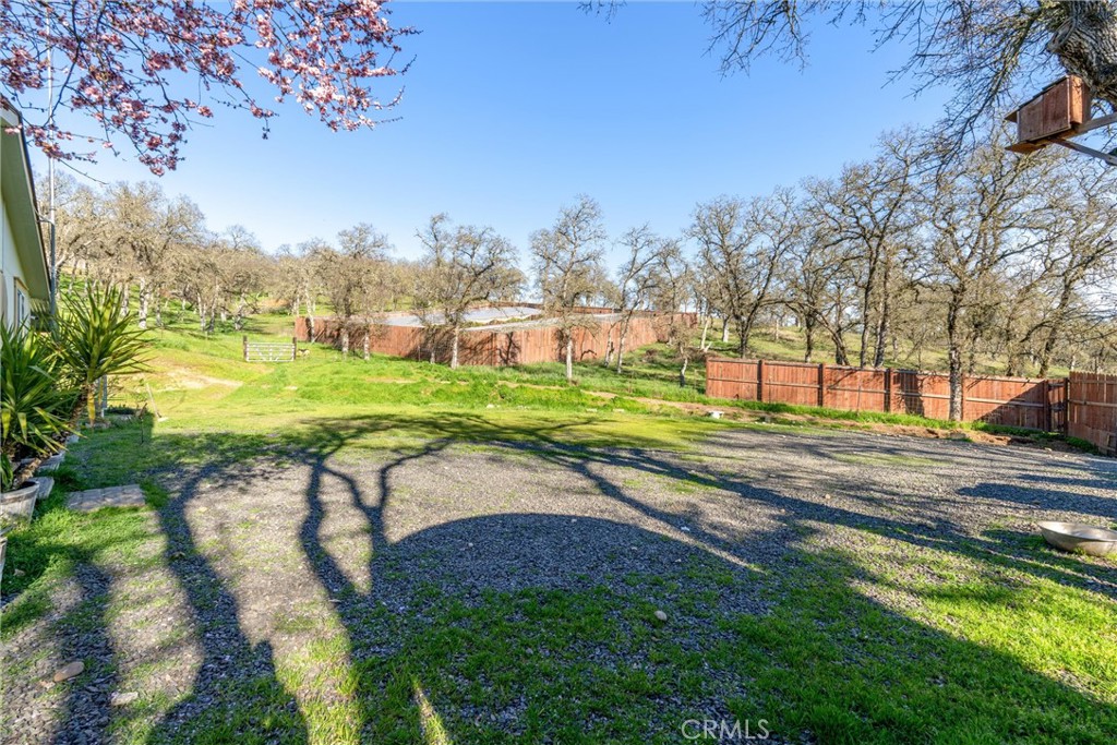 193 Railbridge Road Oroville, CA 95966 - Photo 29 of 32 a view of a yard with a slide