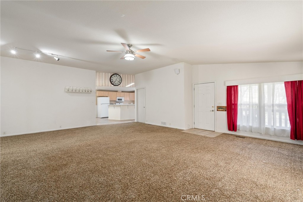 193 Railbridge Road Oroville, CA 95966 - Photo 3 of 32 a view of an empty room with a window