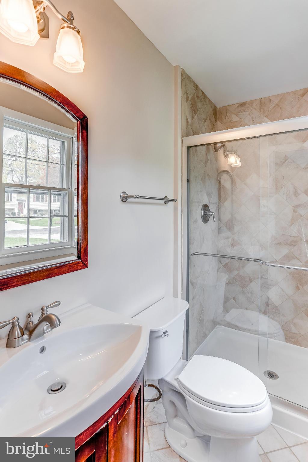 1321 Gresham Road Silver Spring, MD 20904 - Photo 18 of 30 a bathroom with a sink toilet and shower