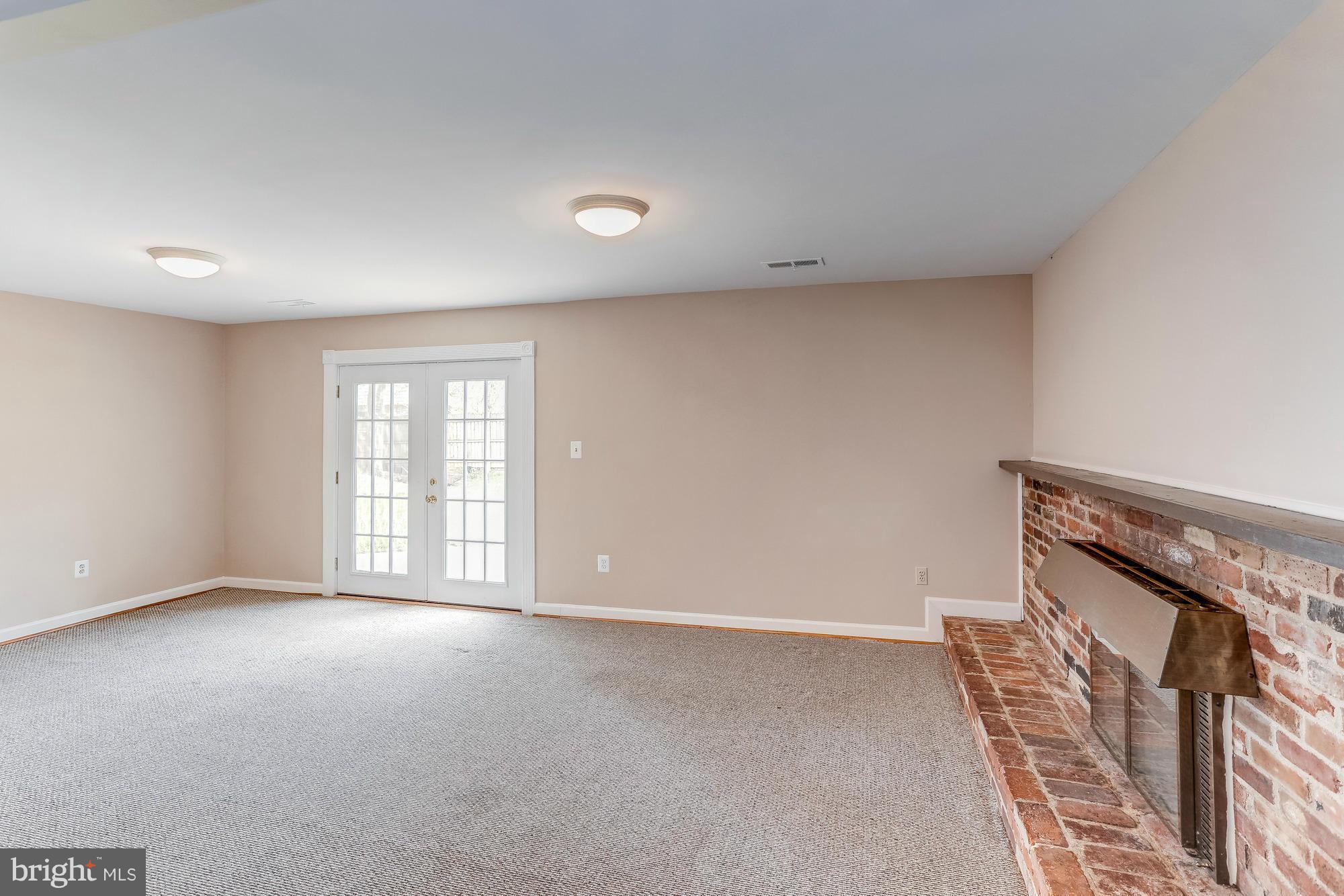 1321 Gresham Road Silver Spring, MD 20904 - Photo 20 of 30 an empty room with windows