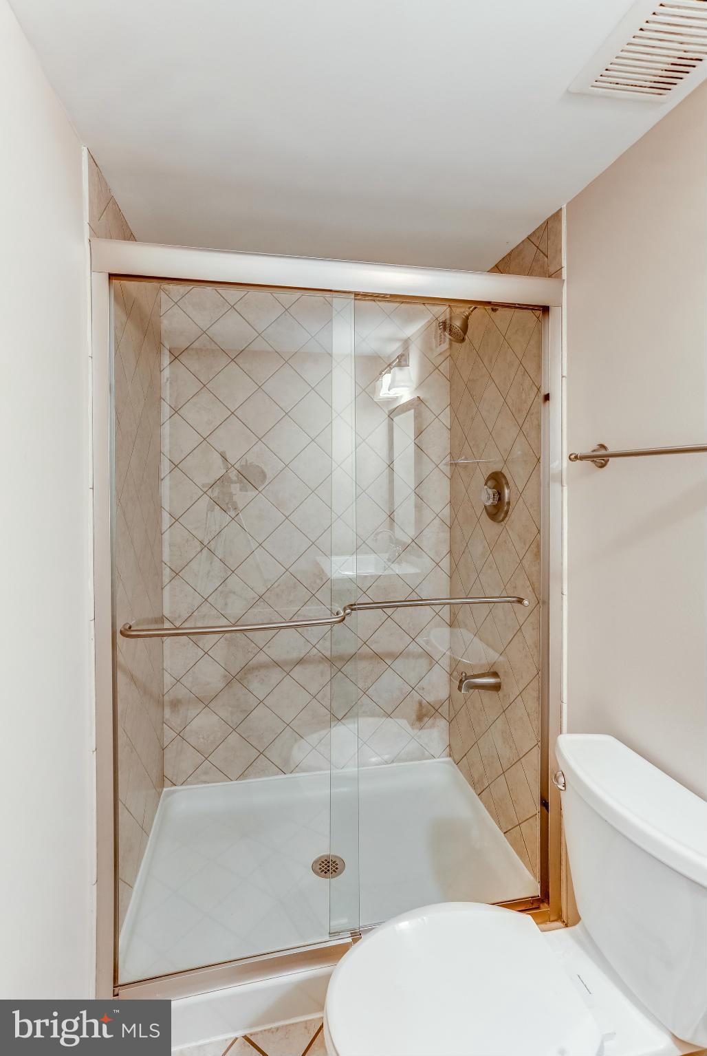1321 Gresham Road Silver Spring, MD 20904 - Photo 25 of 30 a bathroom with a toilet and a bath tub