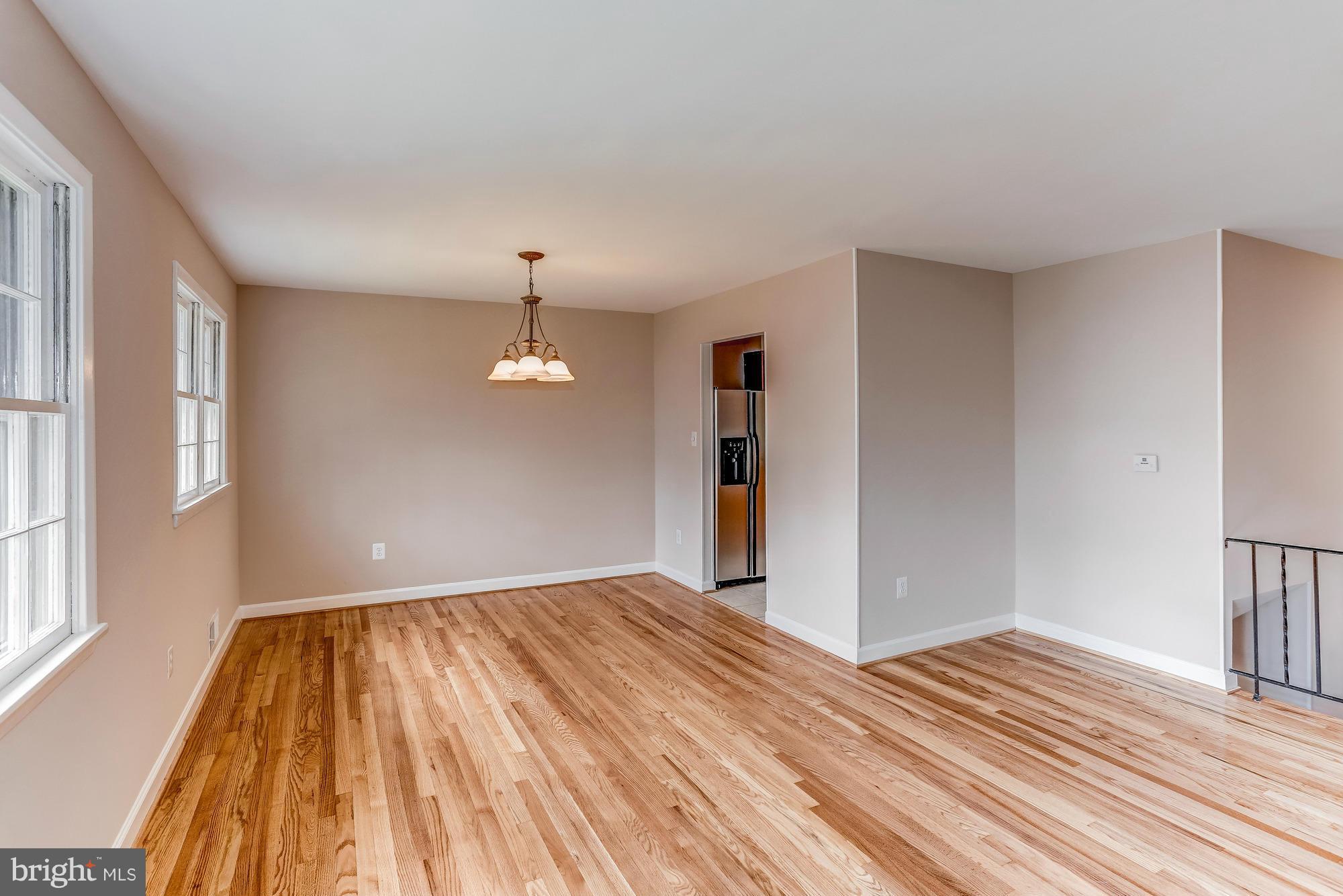 1321 Gresham Road Silver Spring, MD 20904 - Photo 7 of 30 a view of empty room with wooden floor