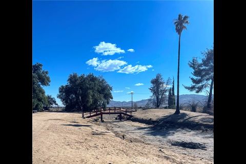 38898 Valley Center Road Daggett, CA 92327 - Photo 19 of 29 a view of a house with a yard