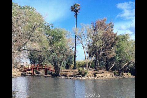 38898 Valley Center Road Daggett, CA 92327 - Photo 3 of 29 a view of a lake with houses