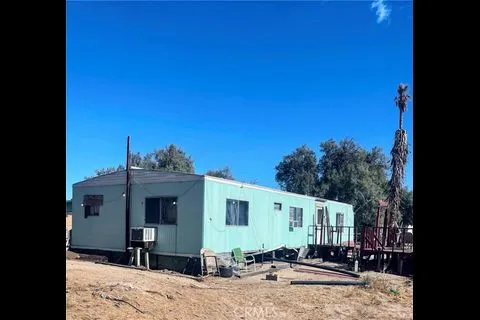 a view of a house with a patio