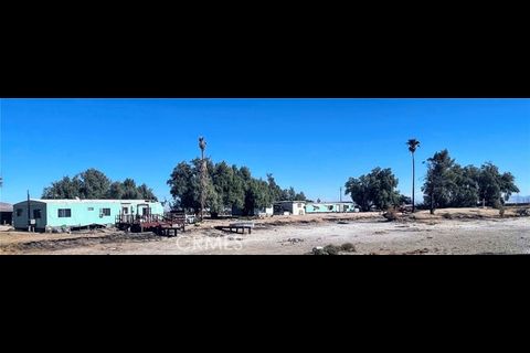 38898 Valley Center Road Daggett, CA 92327 - Photo 10 of 29 a view of a backyard of the house