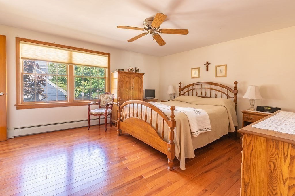 4 Clement Avenue Peabody, MA 01960 - Photo 15 of 25 a bedroom with a bed and a large window
