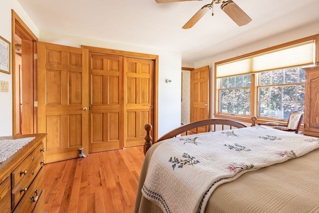 4 Clement Avenue Peabody, MA 01960 - Photo 16 of 25 a bedroom with a bed and a large window