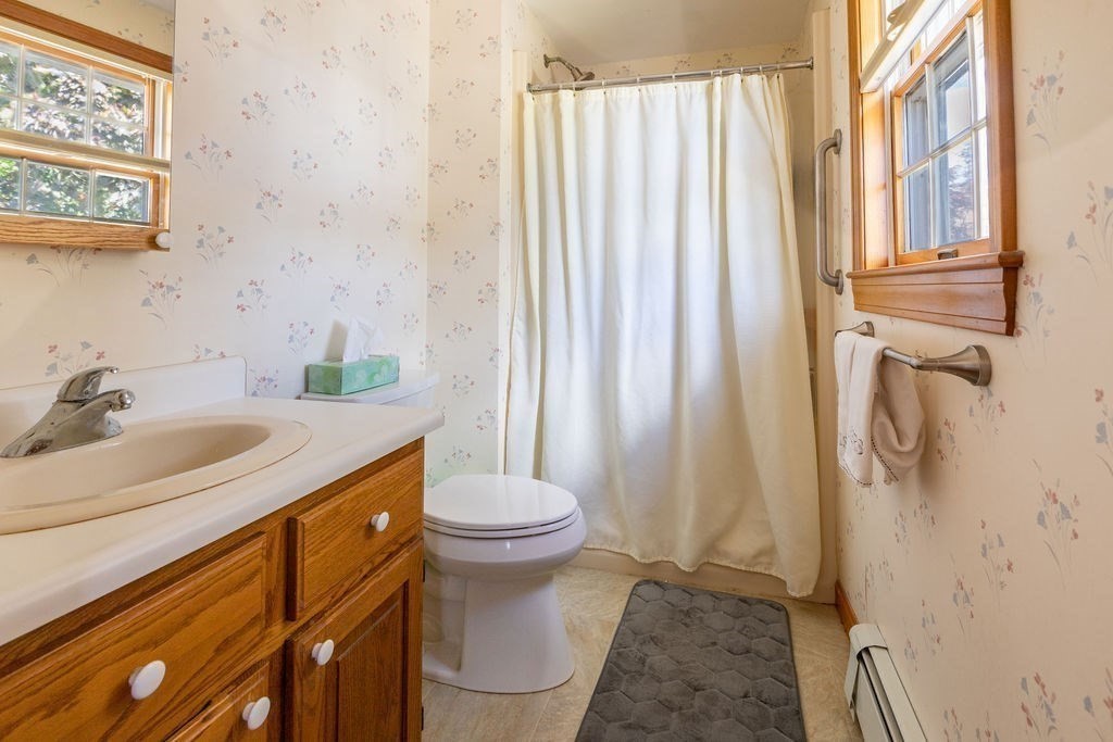 4 Clement Avenue Peabody, MA 01960 - Photo 17 of 25 a bathroom with a sink toilet and shower