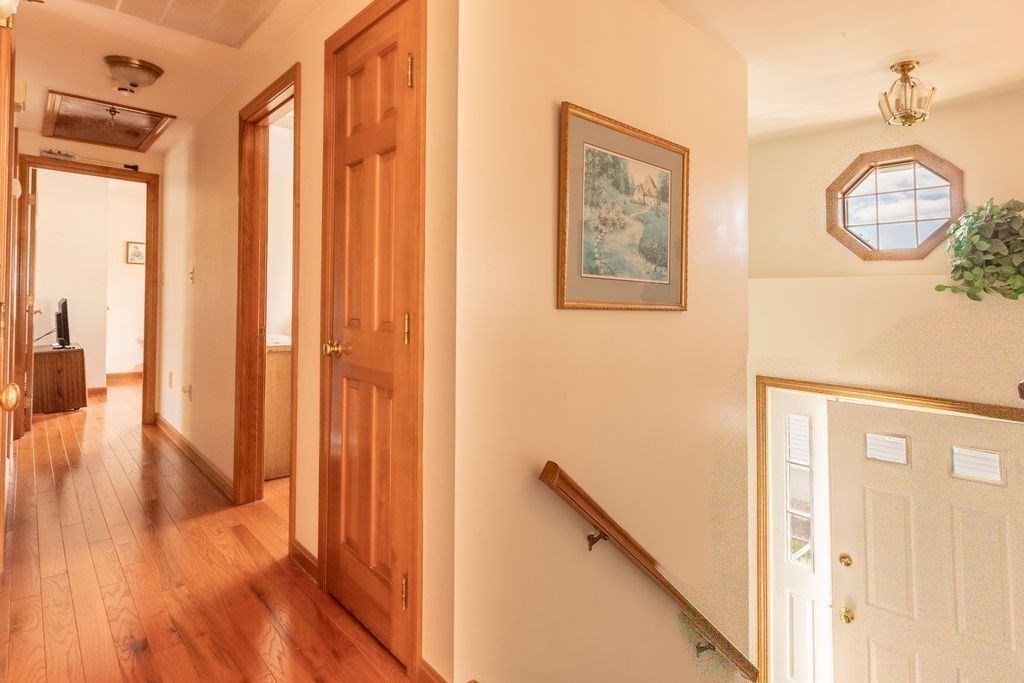 4 Clement Avenue Peabody, MA 01960 - Photo 19 of 25 a view of a hallway with wooden floor