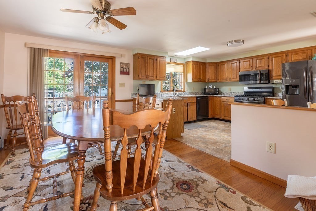 4 Clement Avenue Peabody, MA 01960 - Photo 9 of 25 a view of a dining room with furniture window and wooden floor