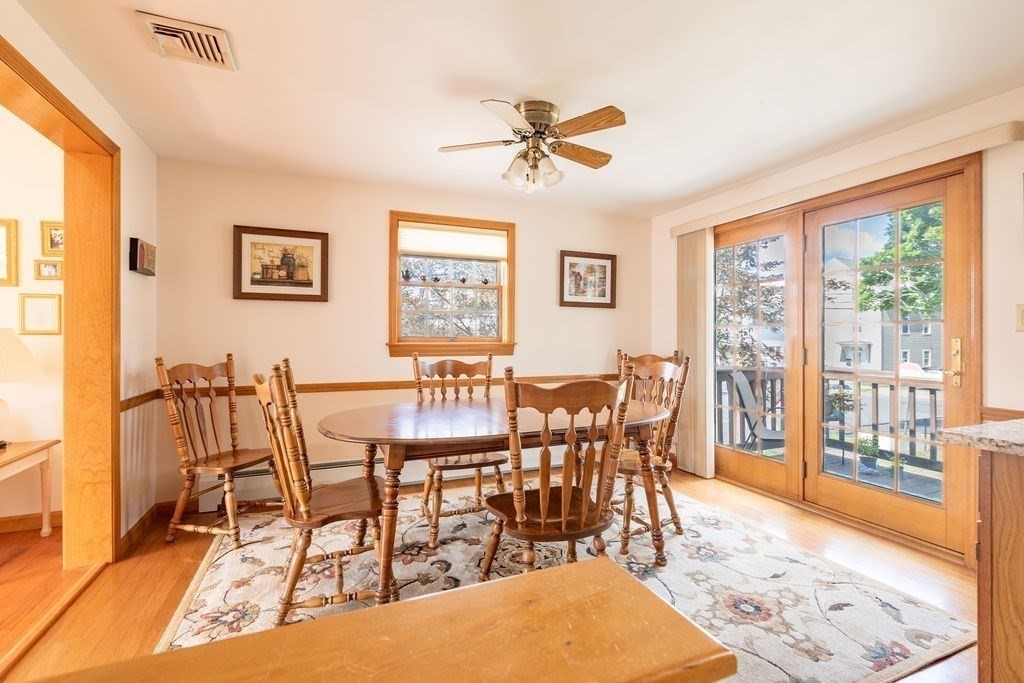 4 Clement Avenue Peabody, MA 01960 - Photo 10 of 25 a view of a dining room with furniture window and wooden floor