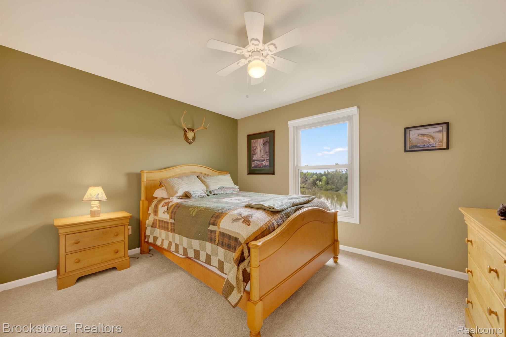 4054 Calumet Drive Rochester, MI 48306 - Photo 21 of 44 Bedroom featuring a ceiling fan and light carpet