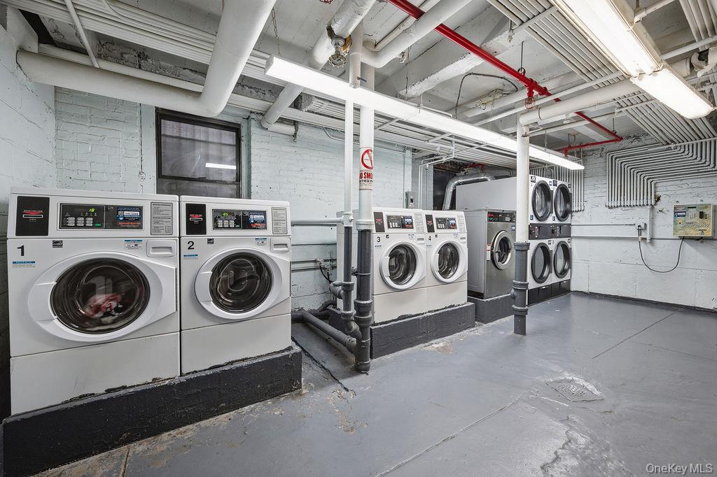 155-01 90th, Unit 3R Queens, NY 11432 - Photo 11 of 16 a utility room with dryer and washer