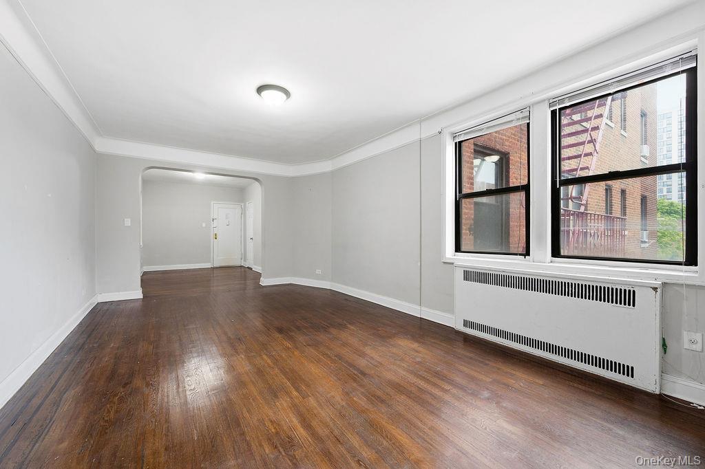155-01 90th, Unit 3R Queens, NY 11432 - Photo 2 of 16 a big room with wooden floor and windows