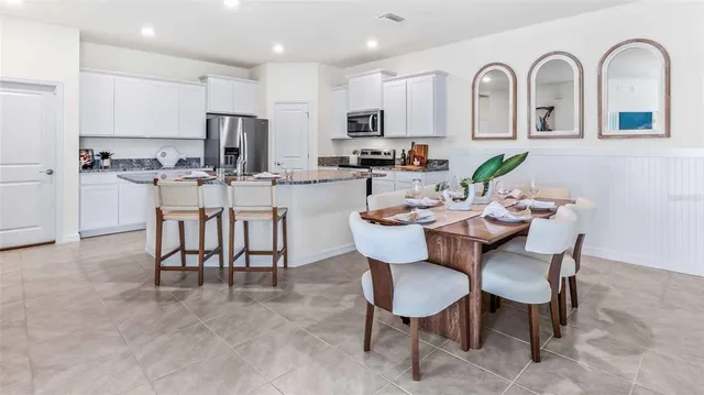 a view of a dining room with furniture